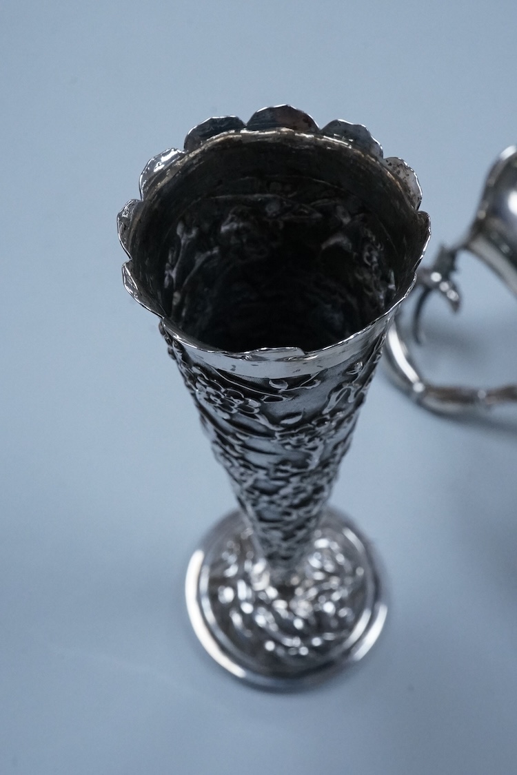 An early 20th century Chinese Export white metal posy vase, by Wang Hing, 18.4cm and a similar ewer by Tien Shing?, lacking cover.